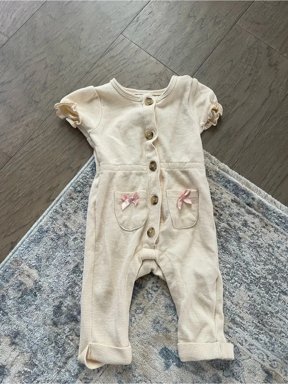Cream Baby One-Piece Bodysuit with Pink Bow Pockets